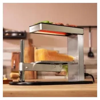 Máquina para raclette con grill fabricada en acero inoxidable y aluminio antiadherente cheese&grill 6000 de Cecotec 3