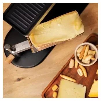 Máquina para raclette con grill fabricada en acero inoxidable y aluminio antiadherente cheese&grill 6000 de Cecotec 4