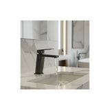 Single lever bathroom sink faucet in brass with metallic black finish Art by Imex