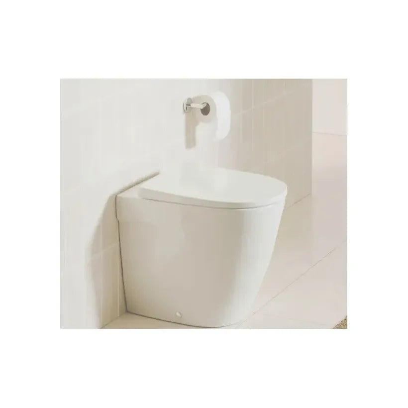 Inodoro tanque alto de porcelana con salida dual y un acabado en color blanco Ona Roca - Vista 2